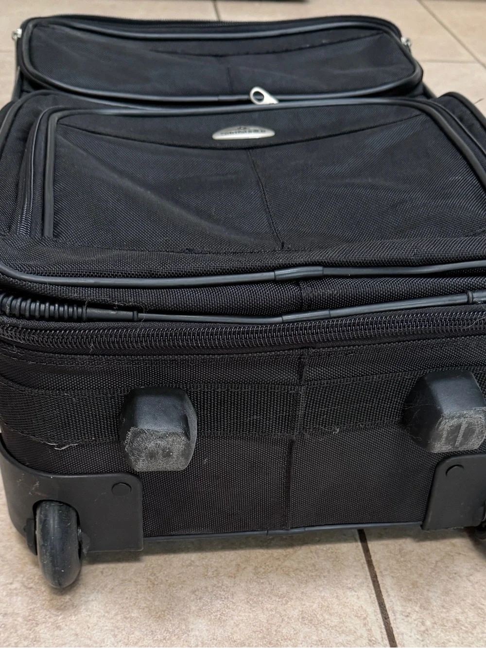 Samsonite Black Upright Rolling Travel Bag with Front Pockets